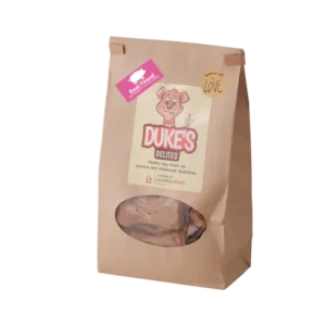Brown paper bag of Dukes dog treats with clear window.