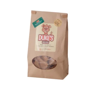 A brown paper bag of Dukes dog treats with a clear window.