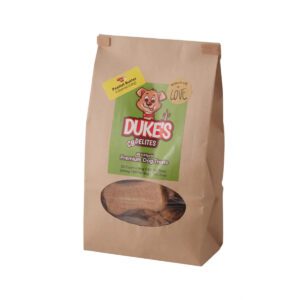 A brown paper bag of Dukes salted caramel cookies with a clear window.
